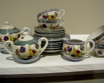 LUSTERWARE Post World War II made in Japan Children's Hand Painted Porcelain Dishes Elephants and Balls Plates Cups Sugar and Cream Pitcher