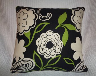 Black and green throw pillow