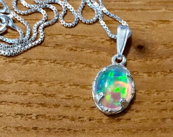 Crystal Opal necklace w/ AMAZING play of color, astonishing flash. 8x10mm gem. Lab-cultured opal in finely etched .925 sterling silver bezel