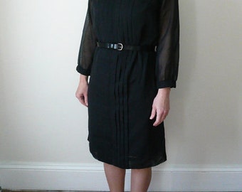 Black shift dress. 1960s black cotton knee length dress. Long sleeve cotton shift.