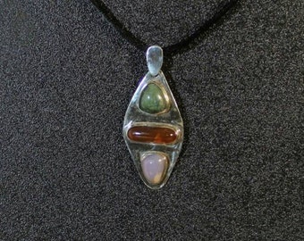 Emerald, Carnelian, Holley Blue agate, and sterling silver pendant