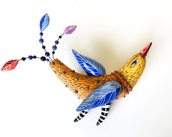 Orange Bird With Blue Whings