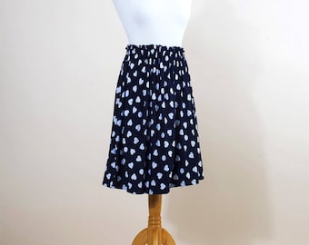 Blue skirt with polka dots and hearts