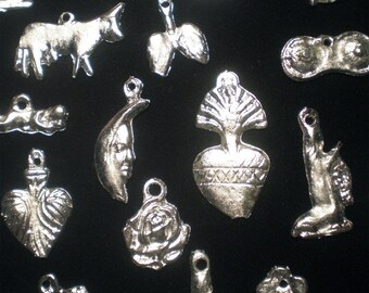 Lot of 25 Mexican religious altar milagros