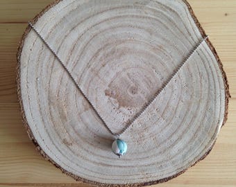 steel necklace pendant silk fabric