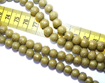 Pearly 6mm Dark Olivine x 25 speckled rounds