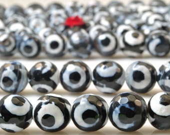 47 pcs of Tibetan Agate three-eyes faceted round beads in 8mm