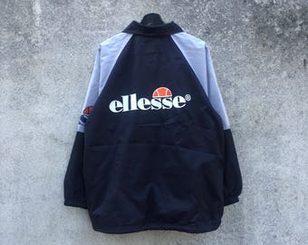 ELLESSE vintage 90s Ellesse big logo spellout multicolour nice sleeves spellout