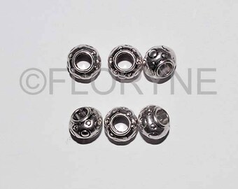 6 beads in silver decorated 6 x 8 Mm
