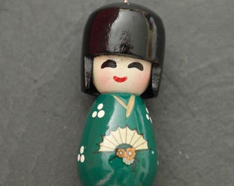 Green wooden Chinese Japanese Kokeshi doll