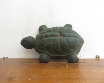 Vintage cast iron Turtle paperweight, yard decor, hang it or not.
