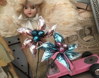 A Small Collection Of Pink & Turquoise Feather Tree Christmas Ornaments
