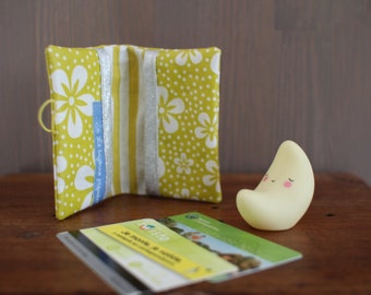Wallet in coated fabric, lime green color with flowers