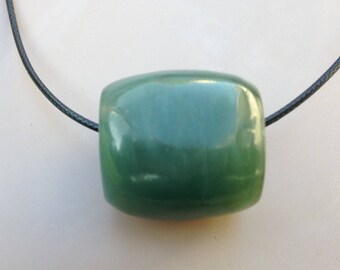 Hand Carved Blue Cassiar Jade Bead.