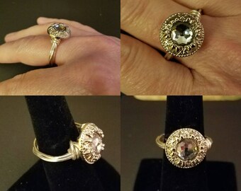 Sterling silver button ring.