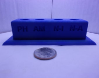 Aquarium water test tube holder with lettering