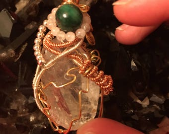 Wire wrapped quartz with malachite