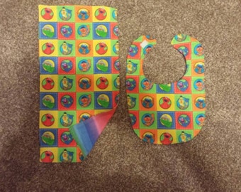 Seasame street bib and burp cloth set.