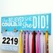 Running Medal Holder and Race Bib Display Featuring The Saying She Believed She Could, So She Did