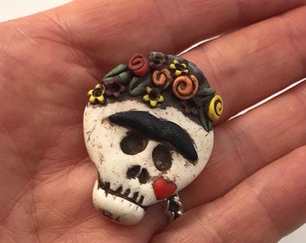 Tiny Frida Dia De los Muertos Brooch by Marie Segal from 2012
