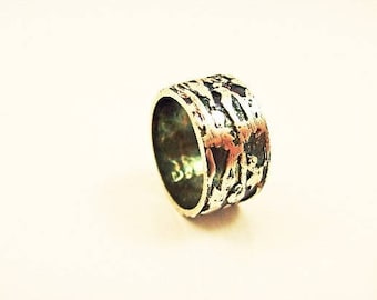 Textured and oxidized silver man "Athor" ring