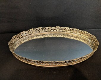 Swanky unmarked vintage mirrored filigree metal vanity tray
