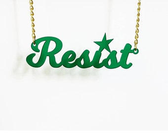 RESIST necklace in transparent dark emerald for nasty women, resisters and persisters.