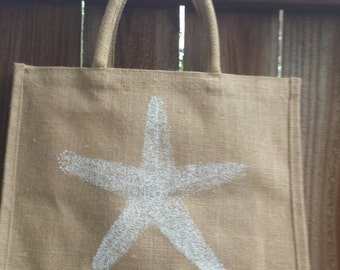 Natural jute tote bag with white starfish