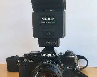 SALE Minolta X-700 35mm Camera with Prime Lens, Minolta Flash Unit, Camera Cases and Instruction Booklets 1985