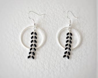 black and silver dangling earrings