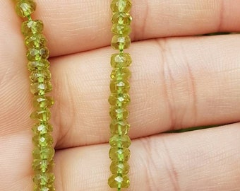AA Peridot Micro-Faceted Rondelles 4-4.5mm ~ 13.5"/ 34cm Strand