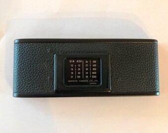 Minolta XG Series film door