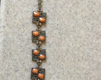 Amber bead bracelet with rhinestones