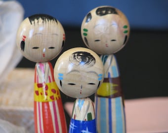 1950’s dime store Japanese kokeshi doll set.