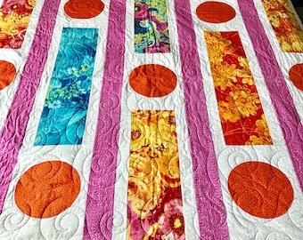 Vibrant Colors and Bold Floral Print Quilt