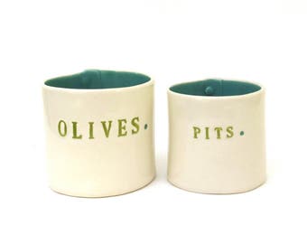 olives and pits ... hand built porcelain containers ... vessels