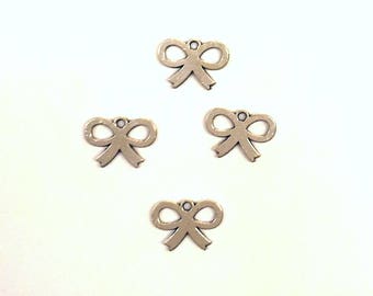 Set of 20 knots T25 silver charms