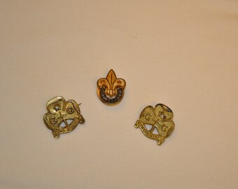 Girl guide and boy scout badges.