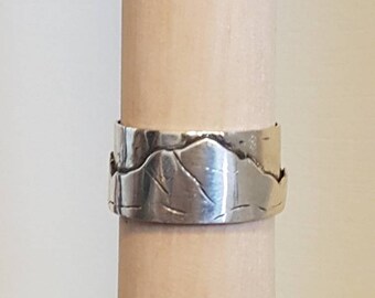 Silver ring with mountains