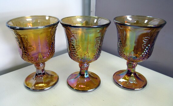 3 amber carnival glass stemmed glasses