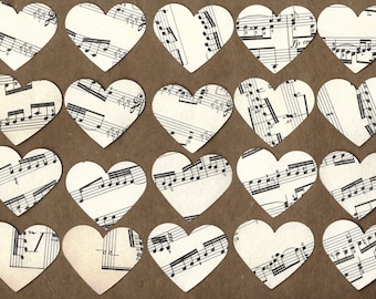 20 large paper hearts punched from vintage sheet music