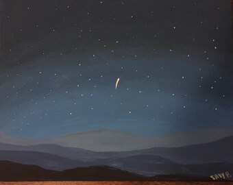 Starry night sky with mountains