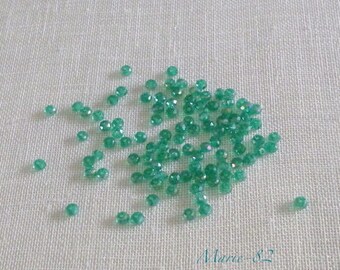 Faceted glass beads - 3 X 2 mm emerald green 90