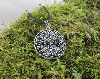 The four dragons, silver finish Locket