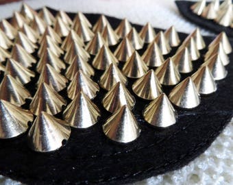 1 Pair of shoulder patch trims, black with gold spikes