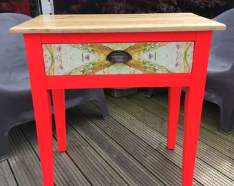 Upcycled console/vanity table in neon red with decoupaged drawer & beeswaxed top.