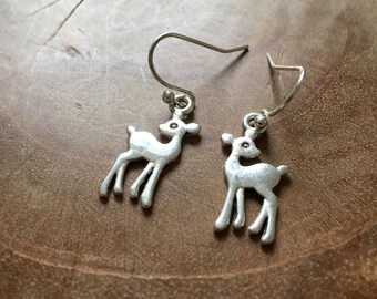 Oh Deer - silvertone dangling earrings with metal silvertone deer - mirrored pair and very cute.