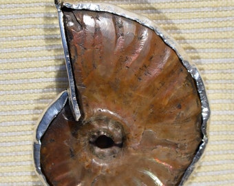 Unique silver pendant with ammonite