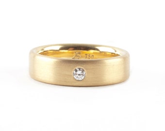 Goldring mit funkelndem Brillanten