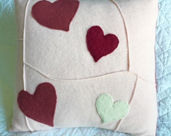 Pink wool pillow with hearts